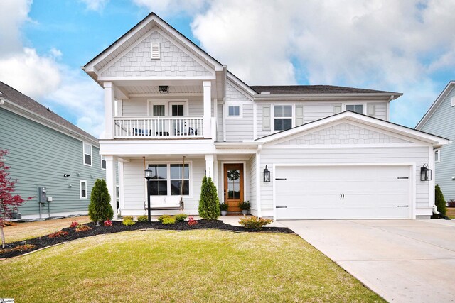 317 Encampment Blvd, Simpsonville, SC 29681 - view of front of home with a balcony, an attached garage, a front lawn, and concrete driveway