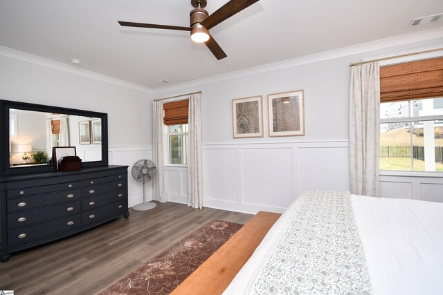 317 Encampment Blvd, Simpsonville, SC 29681 - bedroom featuring dark wood finished floors, visible vents, ceiling fan, and ornamental molding