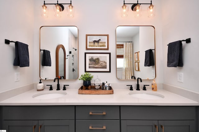 317 Encampment Blvd, Simpsonville, SC 29681 - bathroom with a shower with curtain, double vanity, and a sink
