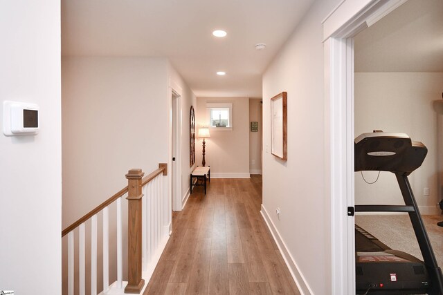 317 Encampment Blvd, Simpsonville, SC 29681 - corridor with an upstairs landing, baseboards, light wood finished floors, and recessed lighting