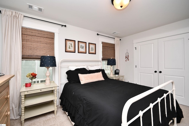 317 Encampment Blvd, Simpsonville, SC 29681 - bedroom with a closet, visible vents, and light carpet