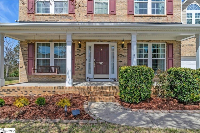 513 Rio Grande Pl, Simpsonville, SC 29680 - property entrance with brick siding and covered porch