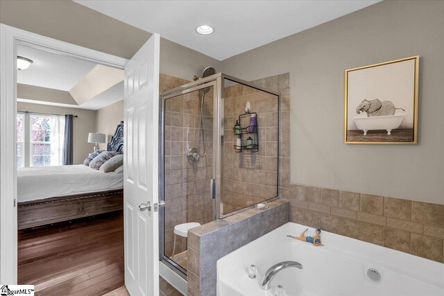 513 Rio Grande Pl, Simpsonville, SC 29680 - bathroom featuring a shower stall, ensuite bathroom, a bath, and wood finished floors