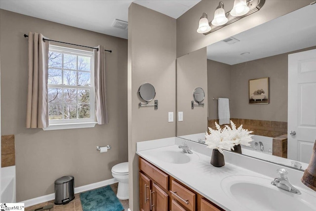 513 Rio Grande Pl, Simpsonville, SC 29680 - bathroom with a sink, visible vents, and a garden tub