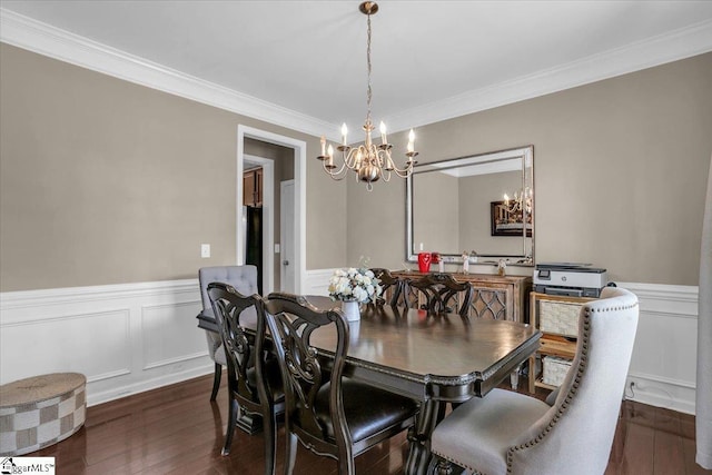 513 Rio Grande Pl, Simpsonville, SC 29680 - dining room with ornamental molding, hardwood / wood-style floors, a chandelier, and wainscoting