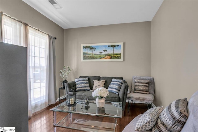 513 Rio Grande Pl, Simpsonville, SC 29680 - living room featuring visible vents, baseboards, and hardwood / wood-style floors