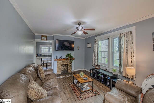 123 Cobb St, Easley, SC 29640 - living area with baseboards, crown molding, wood finished floors, and a ceiling fan