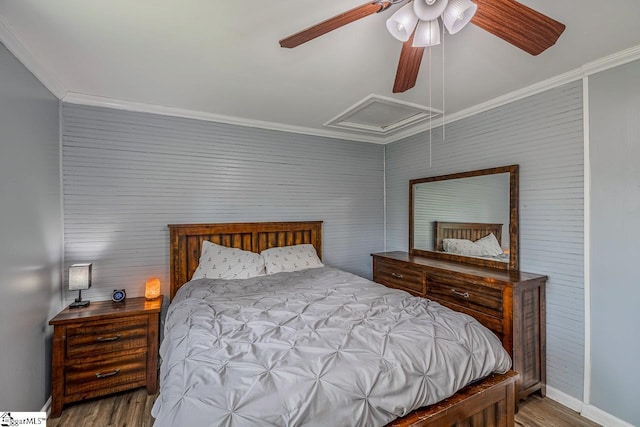 123 Cobb St, Easley, SC 29640 - bedroom featuring crown molding, baseboards, ceiling fan, wood finished floors, and attic access