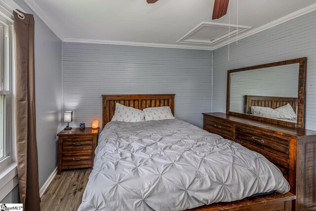 123 Cobb St, Easley, SC 29640 - bedroom featuring attic access, crown molding, wood finished floors, and a ceiling fan