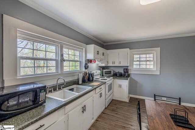 123 Cobb St, Easley, SC 29640 - kitchen featuring a sink, black microwave, white cabinetry, electric range, and dark wood-type flooring