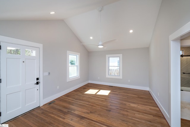 entryway with baseboards, lofted ceiling, dark wood-style flooring, visible vents, and recessed lighting