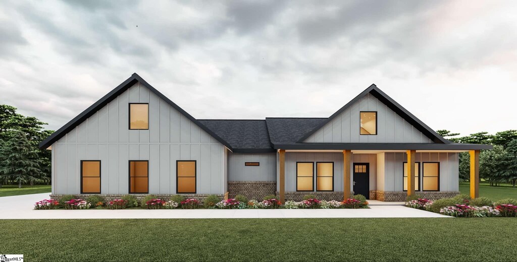 1746 Fish Camp Rd, Chesnee, SC 29323 - modern inspired farmhouse featuring board and batten siding, a front yard, and roof with shingles