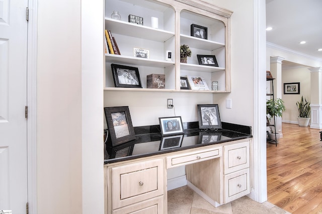 home office with built in study area, light wood-type flooring, ornamental molding, recessed lighting, and ornate columns