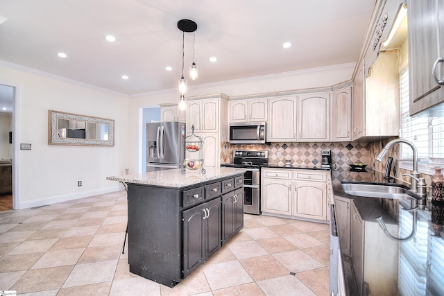 kitchen featuring ornamental molding, stainless steel appliances, a kitchen island, a sink, and backsplash