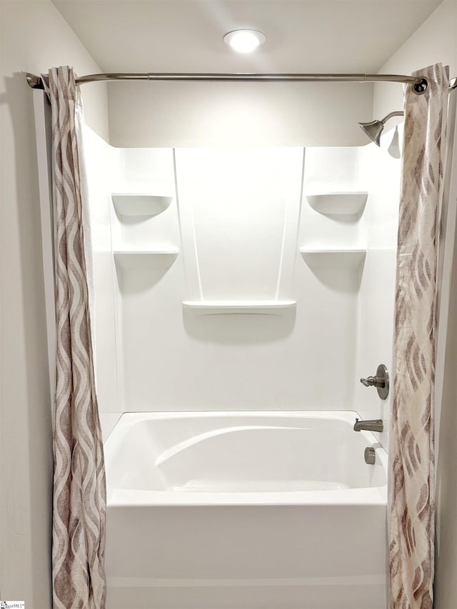 full bathroom with shower / bath combo