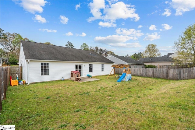 22 Kavanagh Ct, Greenville, SC 29611 - rear view of house featuring a lawn, a fenced backyard, and a playground