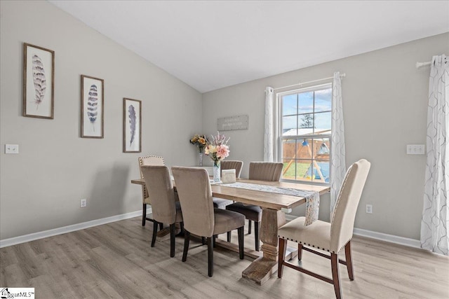 22 Kavanagh Ct, Greenville, SC 29611 - dining area with light wood-type flooring, vaulted ceiling, and baseboards