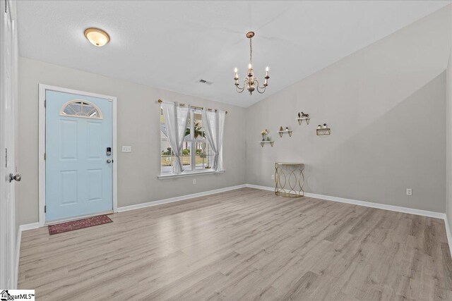22 Kavanagh Ct, Greenville, SC 29611 - foyer entrance featuring baseboards, visible vents, an inviting chandelier, and light wood-style floors