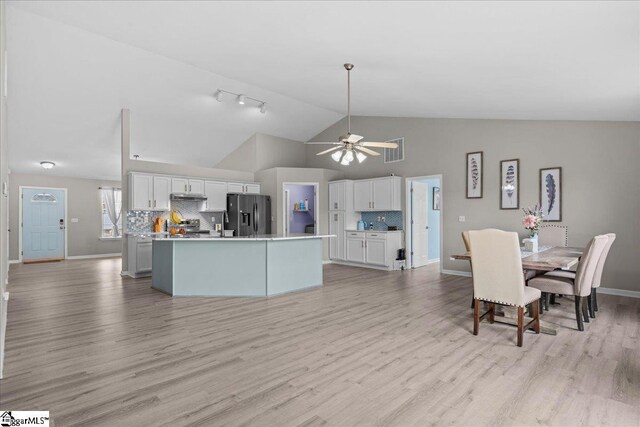 22 Kavanagh Ct, Greenville, SC 29611 - kitchen with white cabinets, baseboards, visible vents, backsplash, and stainless steel fridge with ice dispenser