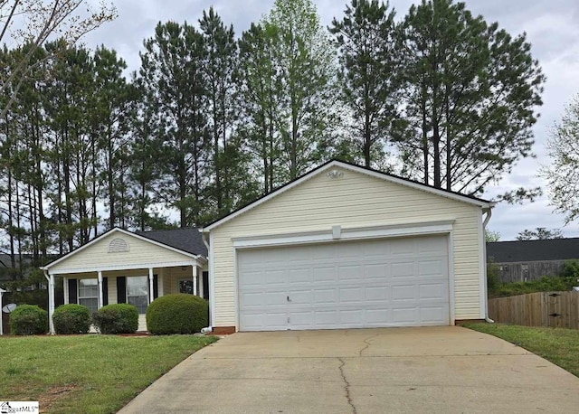 single story home with driveway, a front yard, and fence