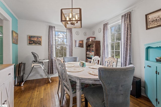 305 Morse St, Pendleton, SC 29670 - dining room featuring dark wood-style flooring, ornamental molding, and a chandelier