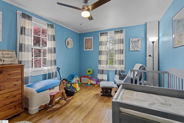 305 Morse St, Pendleton, SC 29670 - bedroom featuring ornamental molding, multiple windows, and wood-type flooring