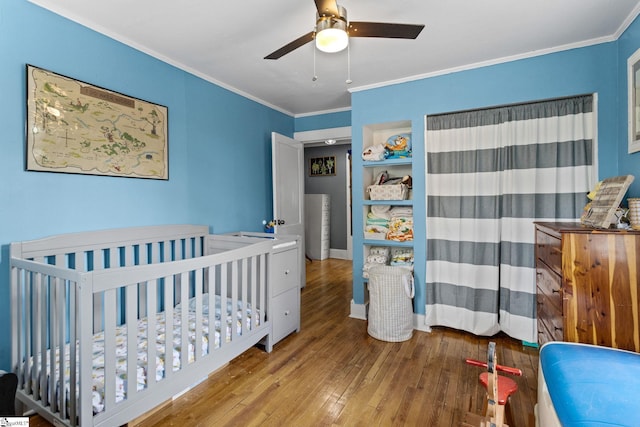 305 Morse St, Pendleton, SC 29670 - bedroom featuring hardwood / wood-style floors, a ceiling fan, a crib, and ornamental molding
