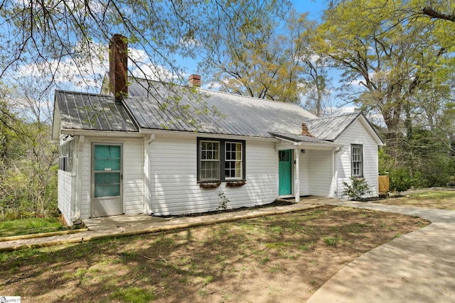 305 Morse St, Pendleton, SC 29670 - view of front facade featuring a chimney and metal roof