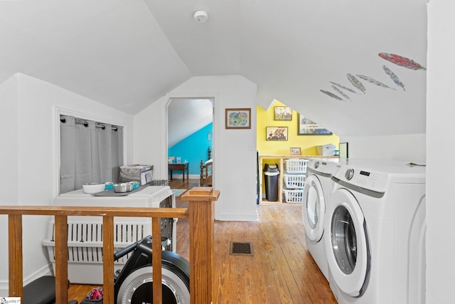 305 Morse St, Pendleton, SC 29670 - washroom with baseboards, light wood-style floors, visible vents, washing machine and dryer, and laundry area
