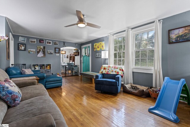305 Morse St, Pendleton, SC 29670 - living room with arched walkways, ceiling fan, and wood finished floors
