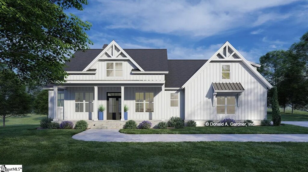 130 Grandview Dr, Easley, SC 29640 - modern inspired farmhouse featuring board and batten siding, a shingled roof, a front lawn, and covered porch