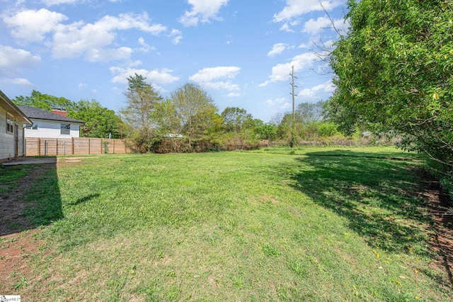 view of yard with fence