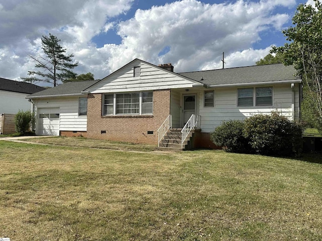 single story home featuring a chimney, crawl space, a front yard, brick siding, and a garage