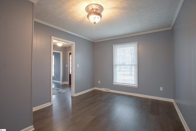 unfurnished room featuring a textured ceiling, ornamental molding, visible vents, baseboards, and dark wood-style floors
