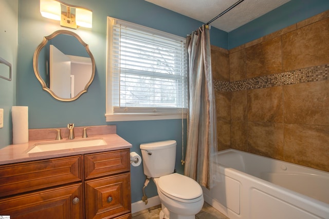 bathroom featuring a textured ceiling, vanity, toilet, shower / bath combo, and baseboards