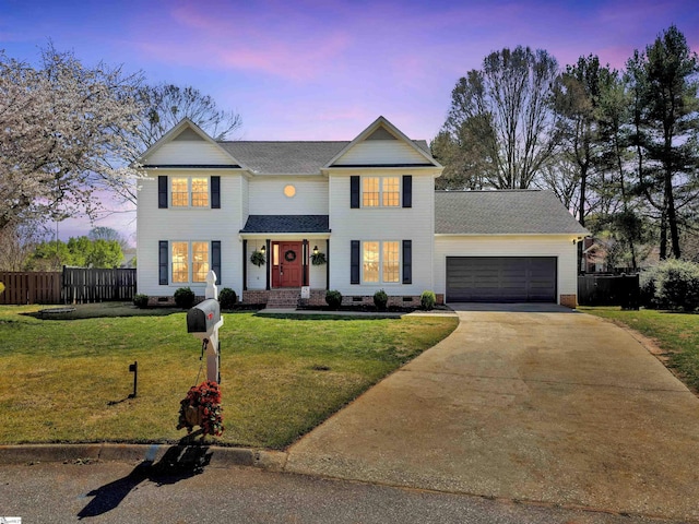 view of front of house with a yard, a garage, crawl space, fence, and driveway