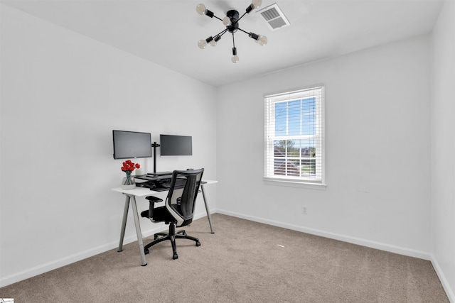 carpeted office space with visible vents, baseboards, and an inviting chandelier