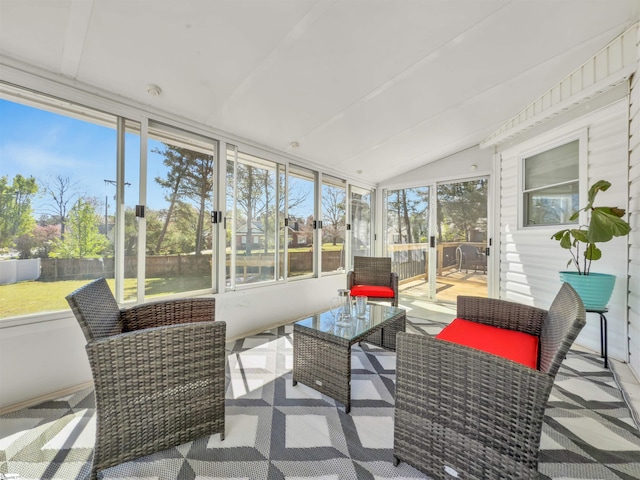 sunroom featuring an outdoor hangout area