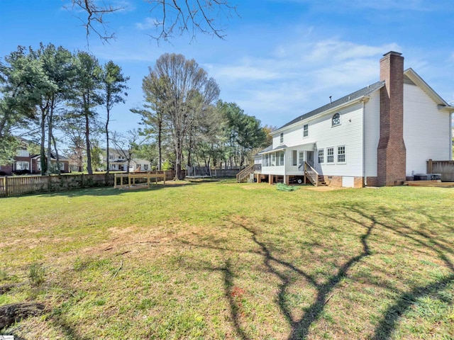 view of yard featuring fence