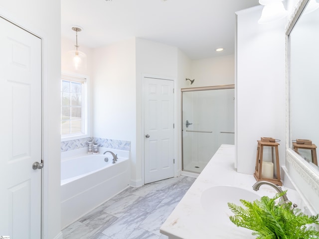 full bathroom with a bath, marble finish floor, a stall shower, and vanity
