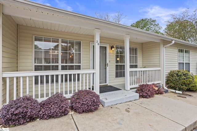 doorway to property with covered porch