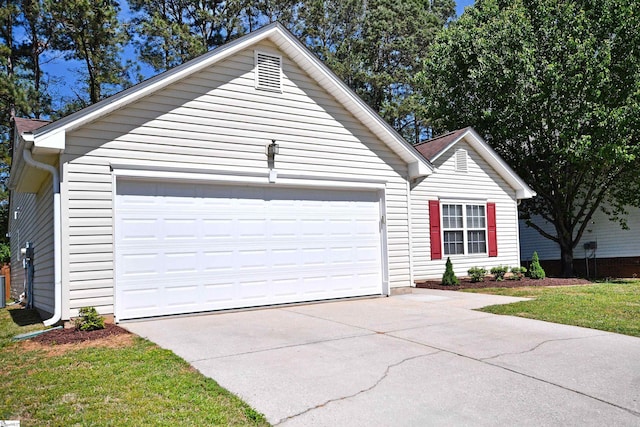single story home with a garage and driveway