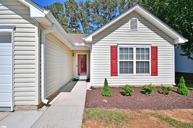 entrance to property featuring a garage