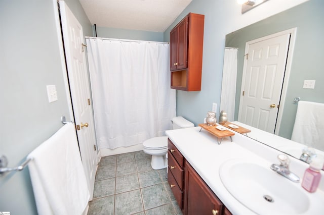 full bath with a shower with shower curtain, vanity, toilet, and tile patterned flooring