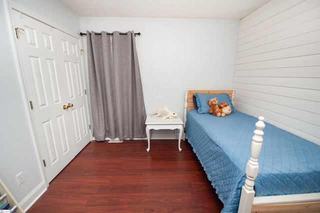 bedroom with wood finished floors