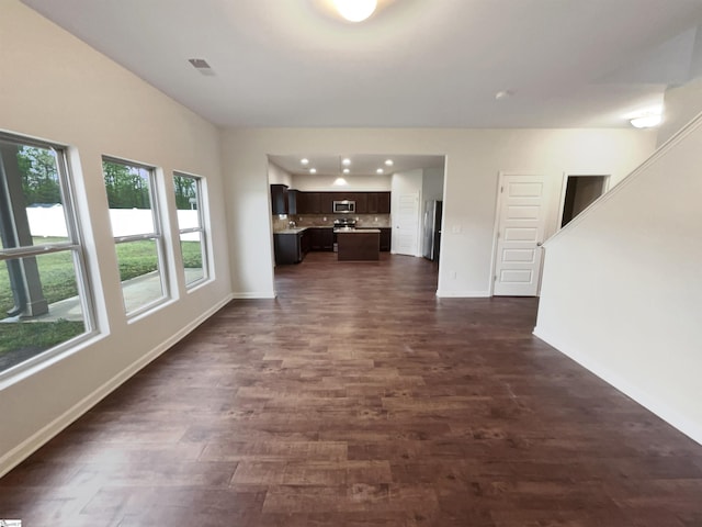 106 Elmhaven Dr, Simpsonville, SC 29681 - unfurnished living room featuring visible vents, baseboards, recessed lighting, and dark wood finished floors