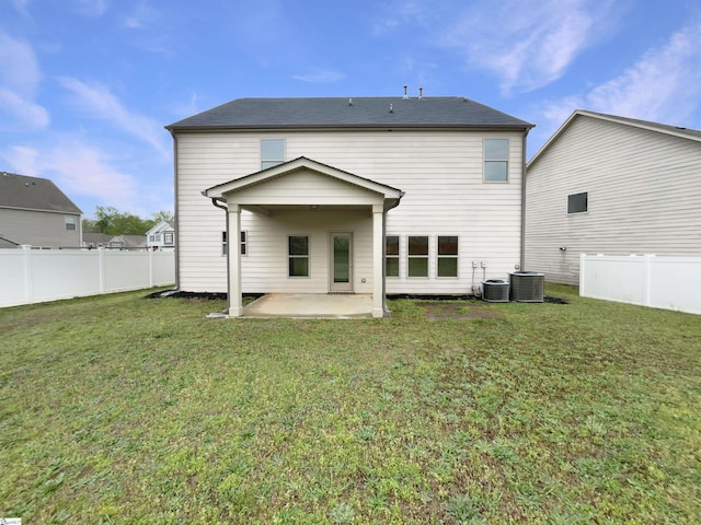 106 Elmhaven Dr, Simpsonville, SC 29681 - back of house with a patio area, central AC, a fenced backyard, and a lawn