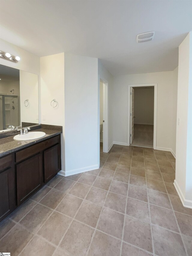 106 Elmhaven Dr, Simpsonville, SC 29681 - bathroom featuring tile patterned flooring, baseboards, and vanity