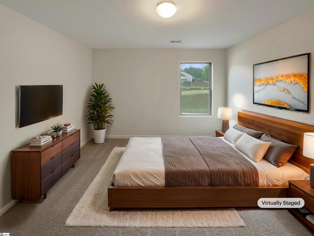 106 Elmhaven Dr, Simpsonville, SC 29681 - bedroom with visible vents, baseboards, and light carpet