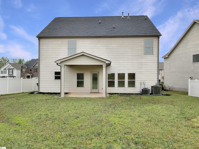 106 Elmhaven Dr, Simpsonville, SC 29681 - rear view of house featuring a patio, central AC, fence, and a lawn